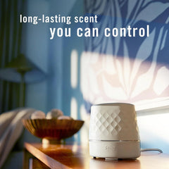 Febreze Plug Scent Booster Air Freshener Oil Diffuser + 2 Downy Calm Refill | Plug-in oil diffuser with Downy Calm refill. Boosts scent for 40 mins. Long cord for flexible placement. Fits every home.